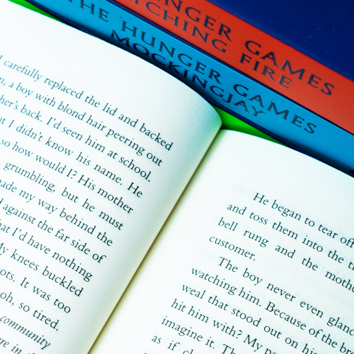 The Hunger Games 4-Book Set by Suzanne Collins | TikTok-Famous YA Fiction, Bestselling Dystopian Series, Adventure Reads for Teens