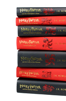 Photo of Harry Potter Slytherin House Collectors Edition Spines by J.K. Rowling on a White Background